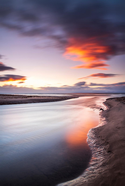 Long-exposure coastal sunset photographed by Hugh Maxwell