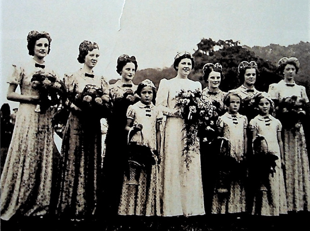 Eva Morton with attendants wearing bow ties in 1939